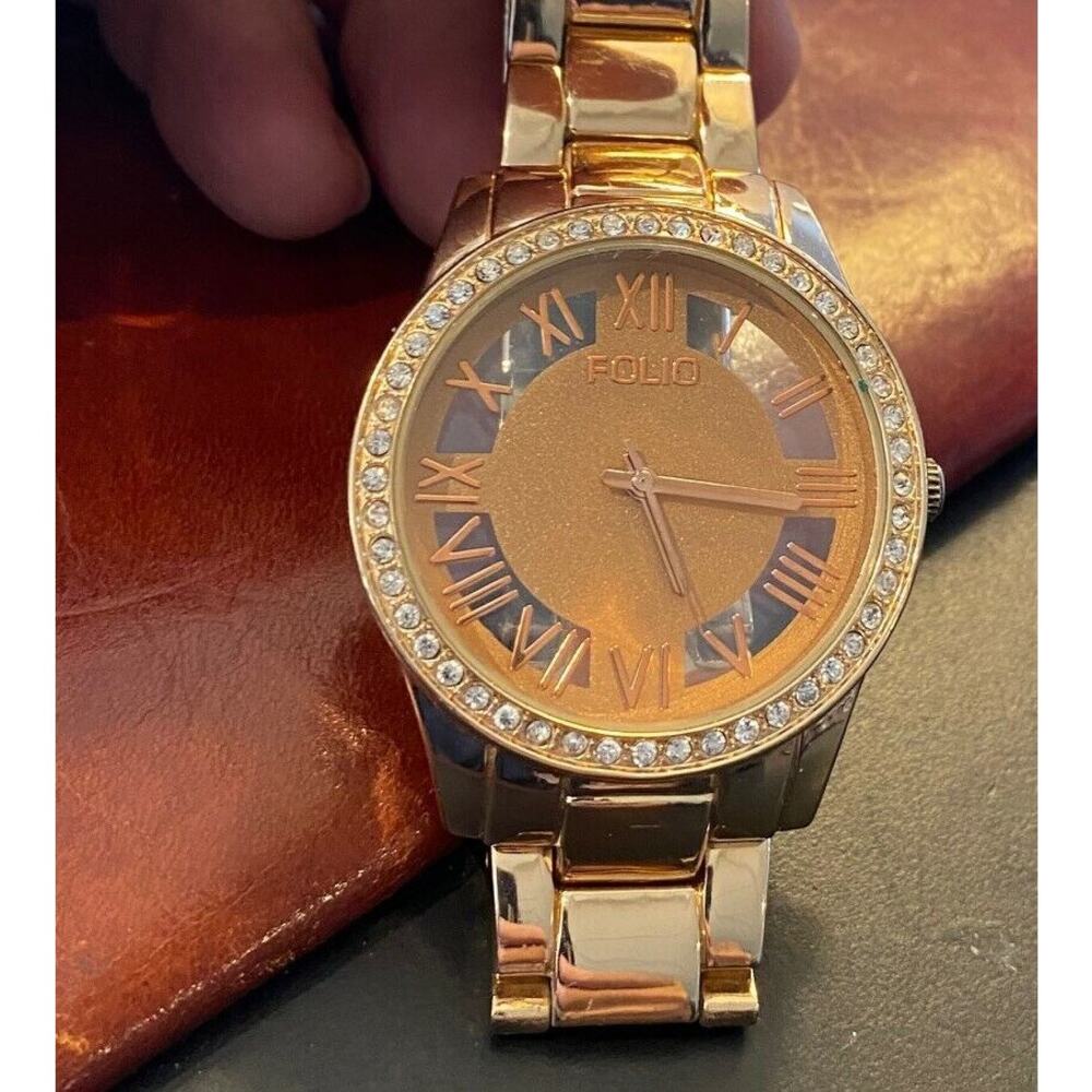 Women's Gold Tone Folio Watch, Crystal Accented Bezel, Roman Numeral Dial